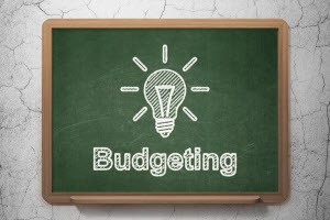 PPC Budget - Light Bulb on Blackboard