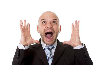 desperate stresses businessman screaming and shouting crazy