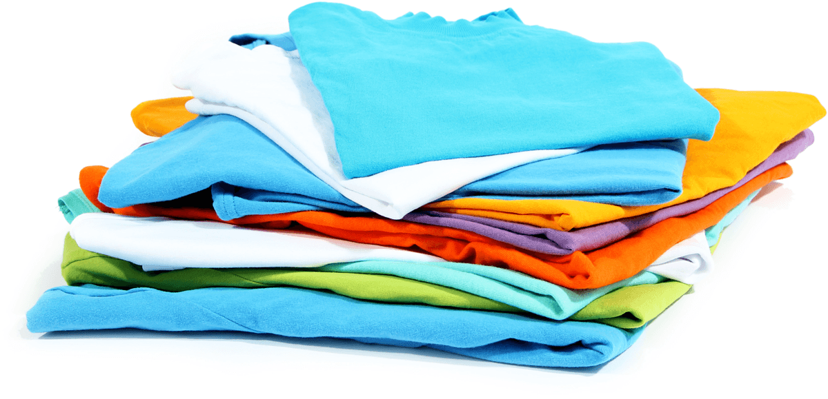 A multi-coloured pile of folded t-shirts.