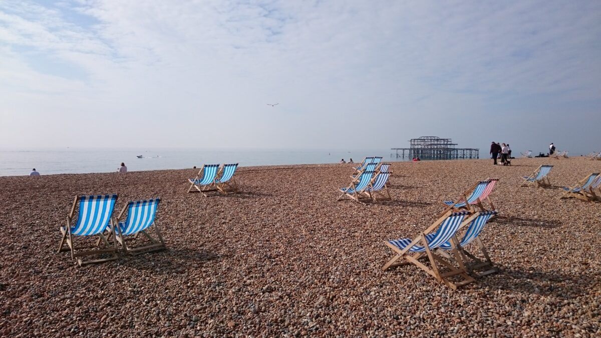 Stripy deck chairs on the beach at Brighton.
