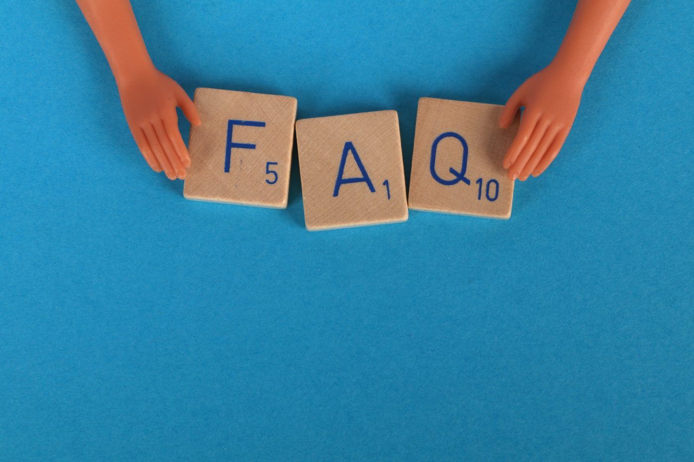 FAQ on large scrabble tiles. Frequently Asked Questions and how t o set up a FAQ page on your website.