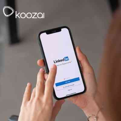 Person on mobile phone logging into LinkedIn