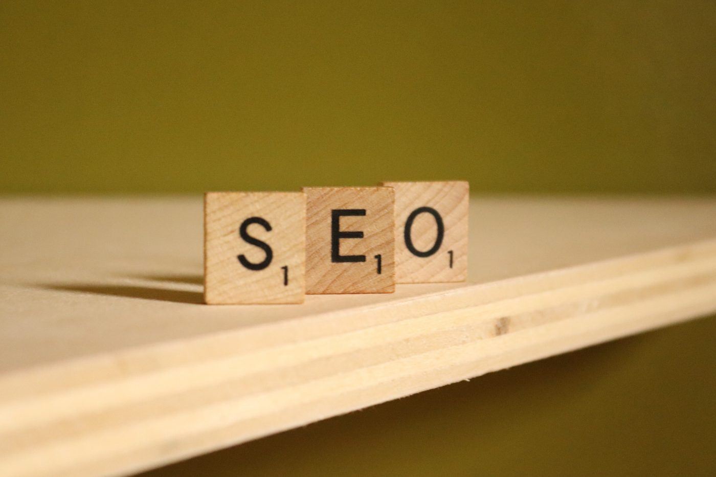 image of SEO scrabble tiles on a light wood desk