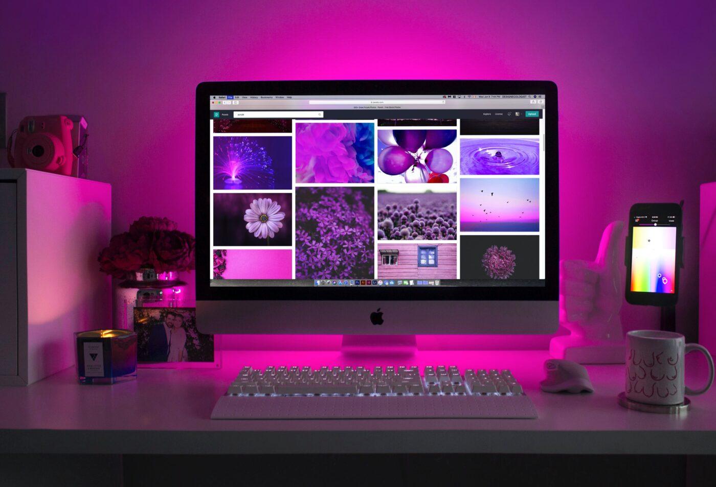 A desktop screen and mobile phone both showing the same website page to ilustrate how the page is a responsive design.